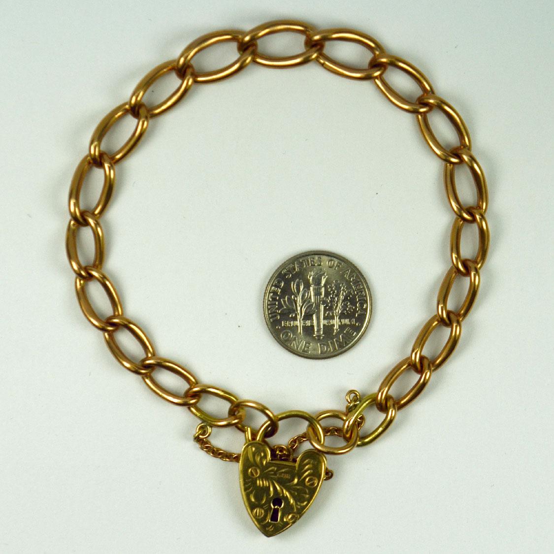 Georg Jensen 9K Rose Gold Engraved Heart Padlock Curb Link Bracelet In Good Condition For Sale In London, GB
