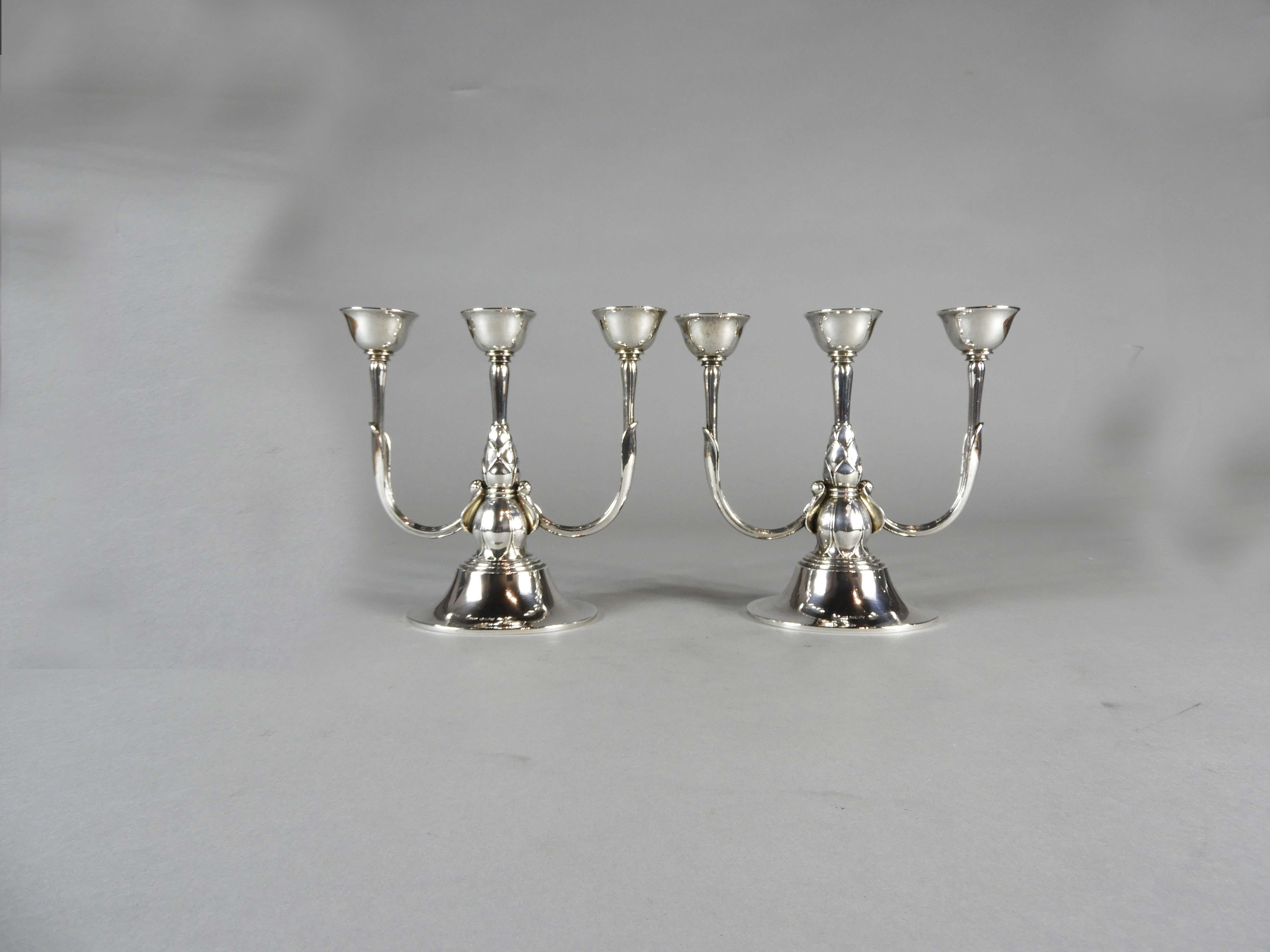 Georg Jensen, a Pair of Three Light Sterling Candelabra In Good Condition For Sale In Montreal, QC