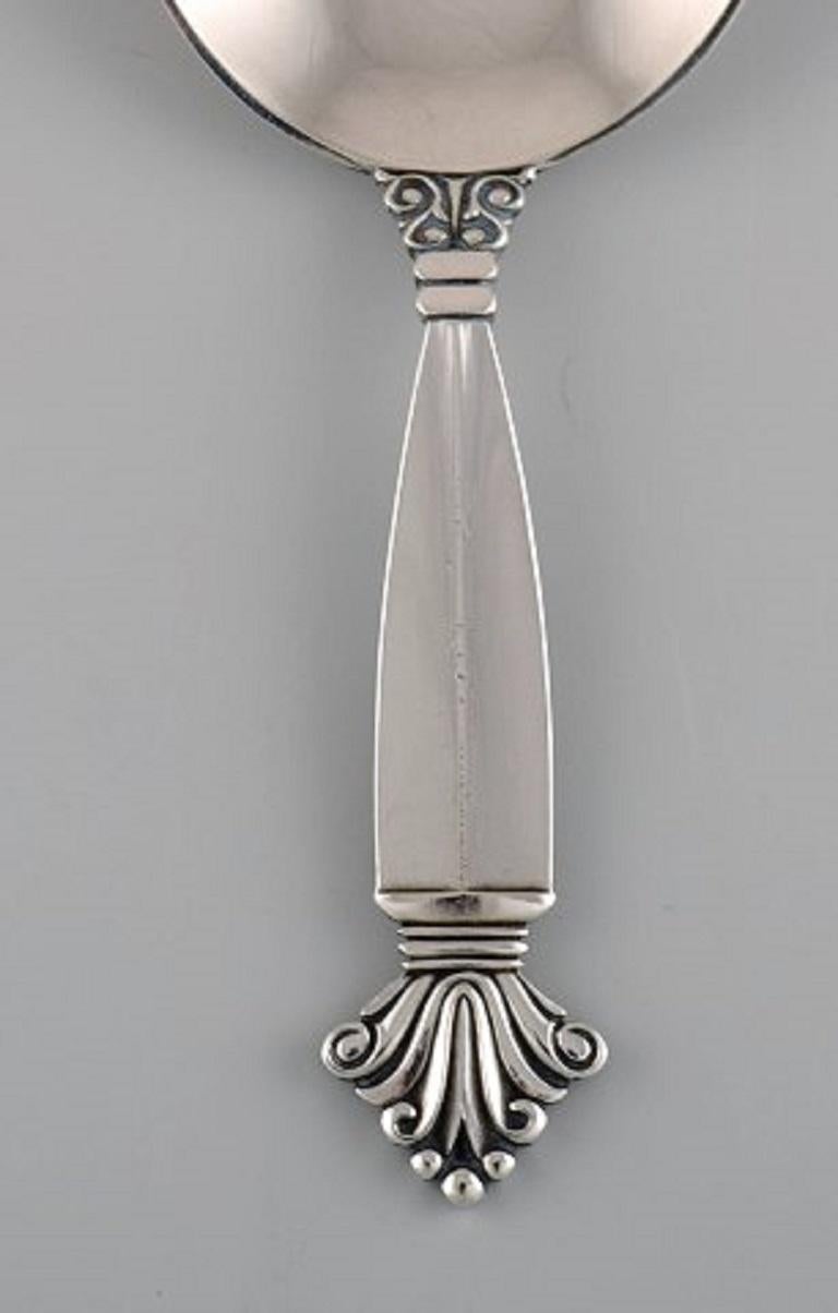 Georg Jensen Acanthus jam spoon in sterling silver.
Measures: Length 10.5 cm.
Stamped.
In excellent condition.
Our skilled Georg Jensen silversmith / jeweler can polish all silver and gold so that it appears as new. The price is very reasonable.
