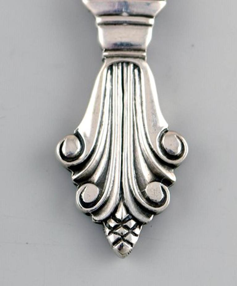 Georg Jensen Acanthus serving spade in full silver, acanthus silverware, Georg Jensen.
Designed by Johan Rohde.
Measures: Length 15.5 cm.
In very good condition.
