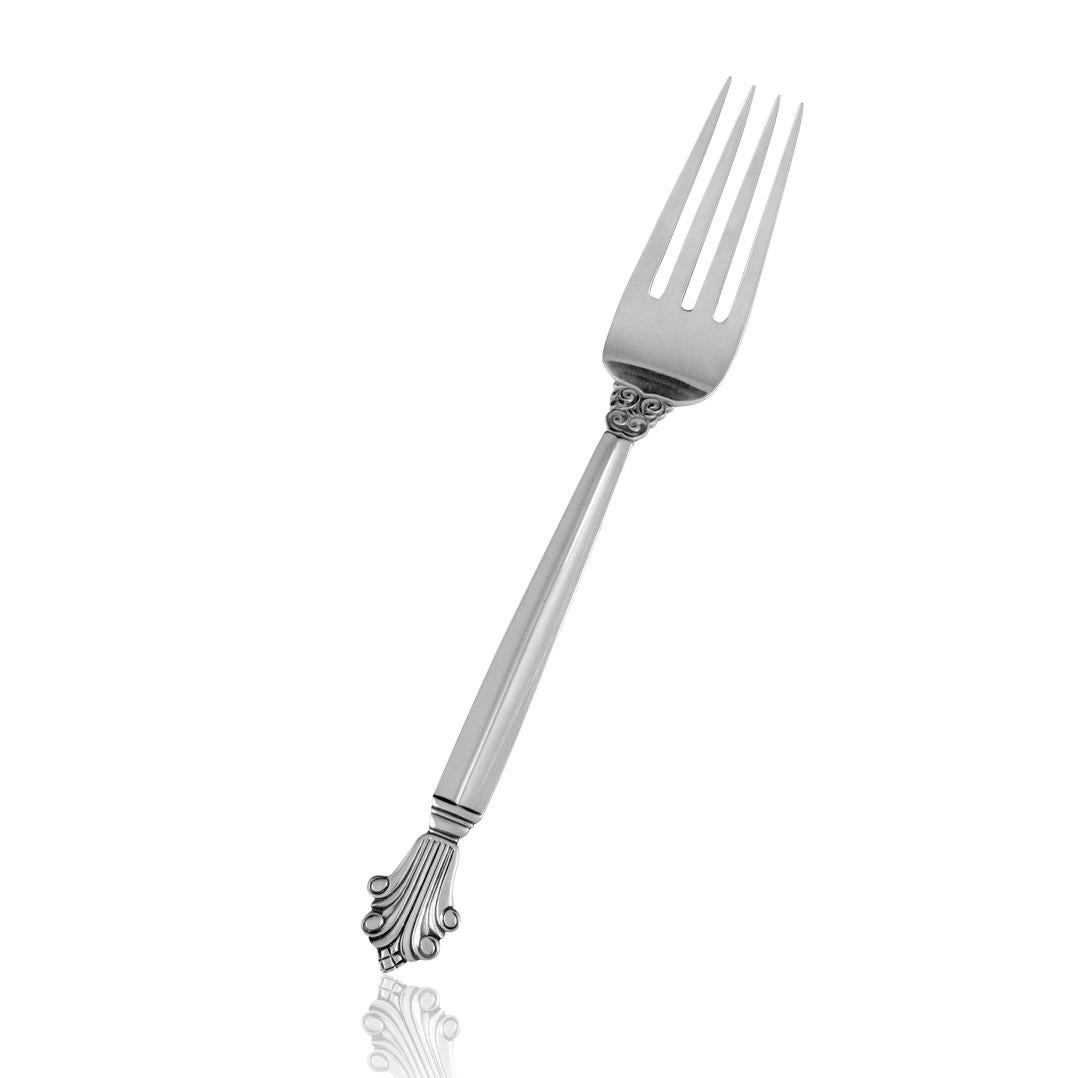 This exquisite, complete set of Georg Jensen sterling silverware features the elegant Acanthus pattern, designed by Johan Rohde in 1917. The Acanthus pattern is the distinguished counterpart to Rohde’s famous Acorn silverware, known in Denmark as