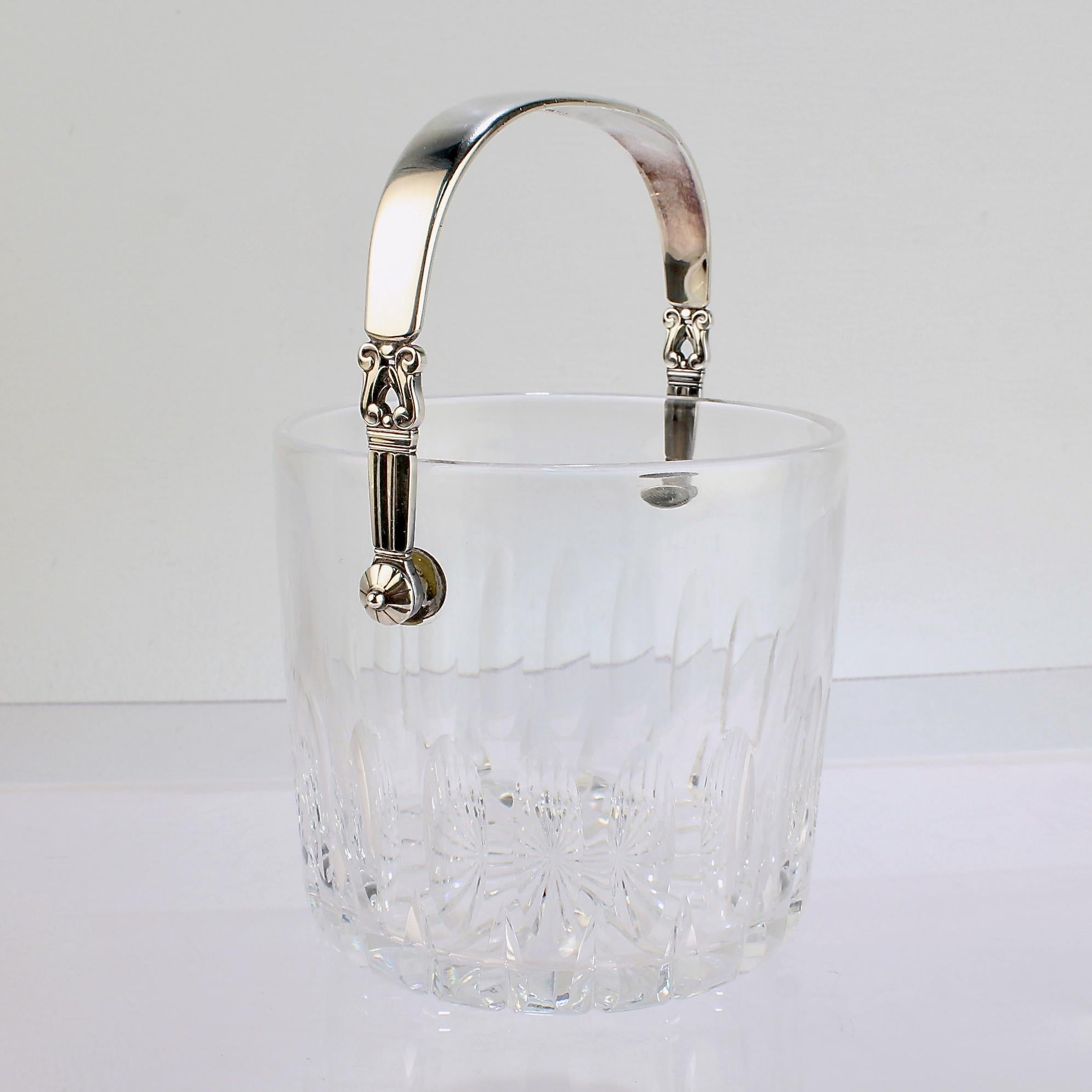 A fine Acorn pattern sterling silver and cut glass ice bucket.

Designed by Johan Rohde for Georg Jensen.

Model no. 1137.

Simply a wonderful cocktail or bar accessory!

Date:
20th Century

Overall Condition:
It is in overall good, as-pictured,