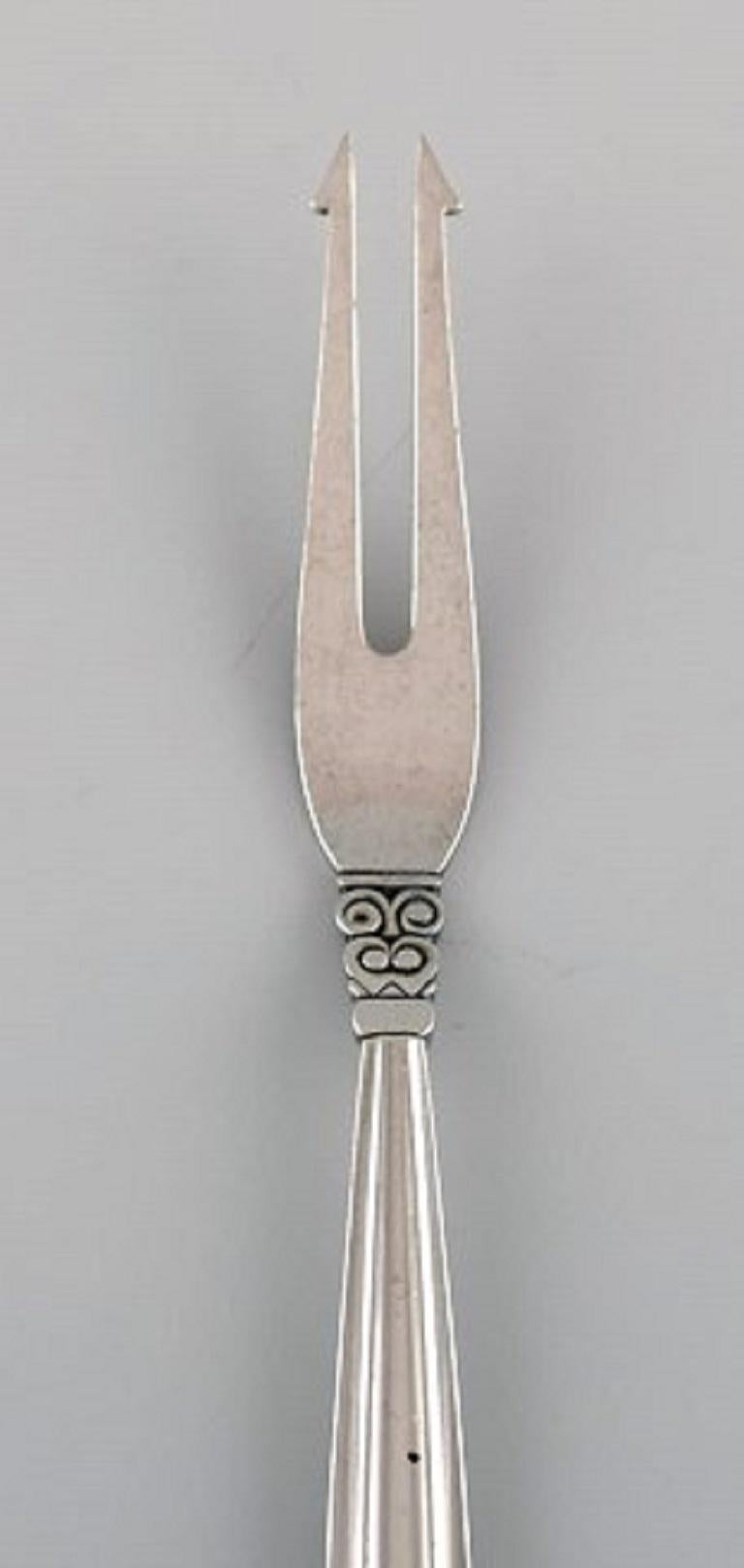 Georg Jensen Acorn pickles fork in sterling silver.
Measures: Length 16.8 cm.
In very good condition.
Stamped.