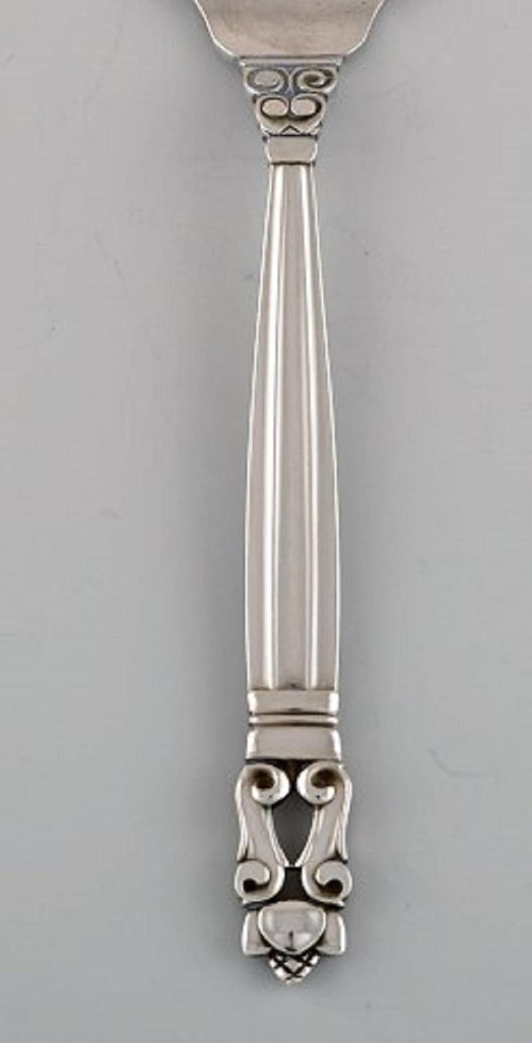 Georg Jensen Acorn salad fork in sterling silver. Seven forks available
Measure: Length 16.7 cm.
Stamped.
In excellent condition.
Our skilled Georg Jensen silversmith / jeweler can polish all silver and gold so that it appears as new. The price