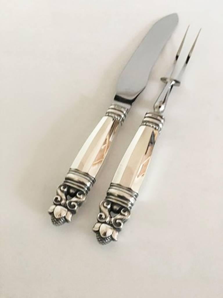 Georg Jensen Acorn Sterling Silver carving set knife and fork. Measures 32 cm and 27.3 cm / 12 3/5 in. and 10 3/4 in.