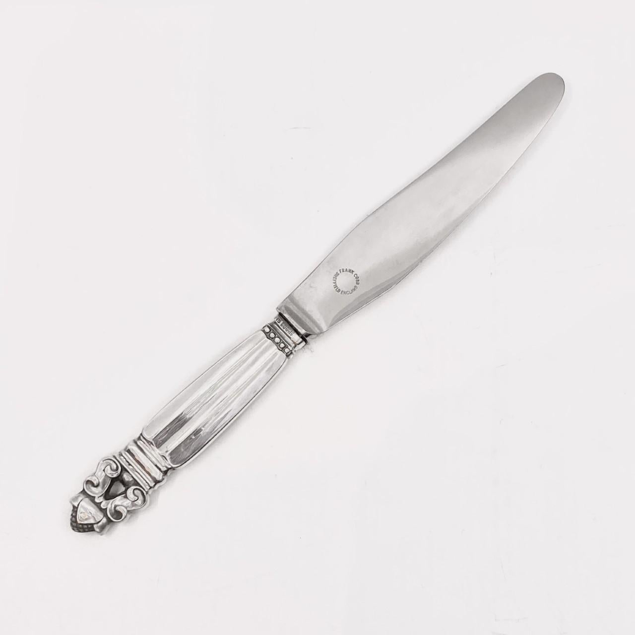 Vintage Georg Jensen short handle luncheon knife, sterling silver handle and stainless steel blade, item #023 in the Acorn pattern, design #62 by Johan Rohde from 1915.

Additional information:
Material: Sterling silver, stainless steel
Styles: Art