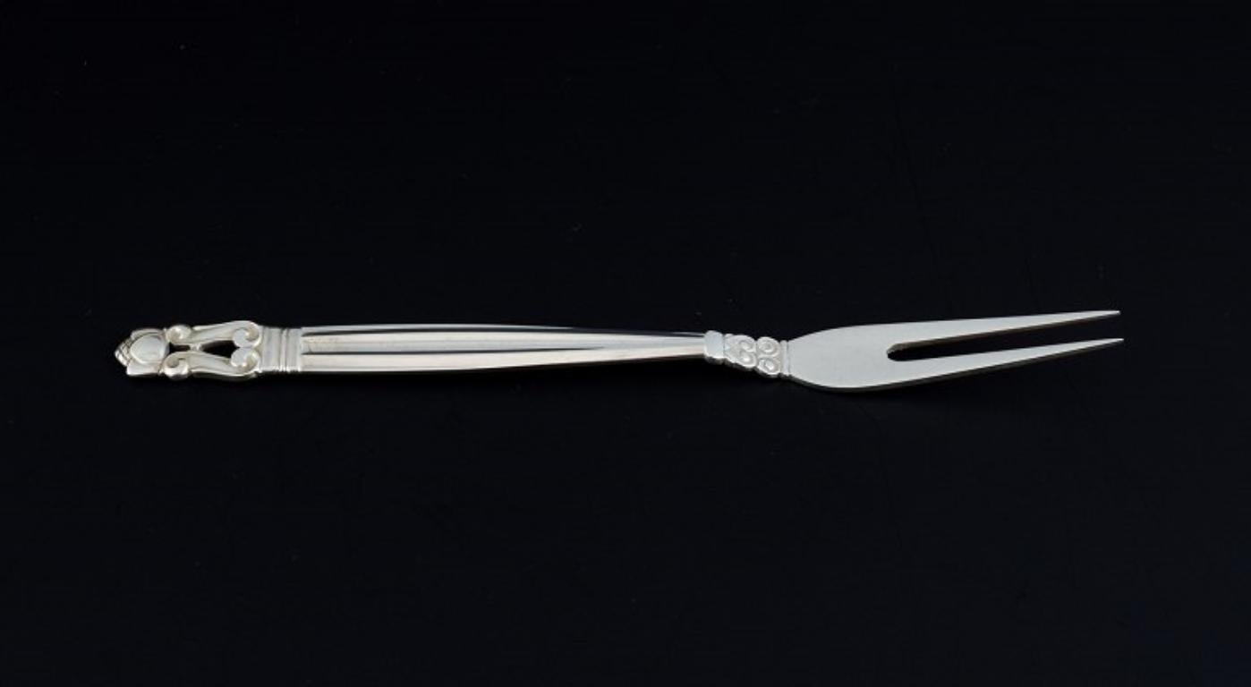 Georg Jensen, Acorn, two cold cuts forks in sterling silver.
Stamped after 1945.
In perfect condition with minimal signs of use.
Measurements: L 16.6 cm.