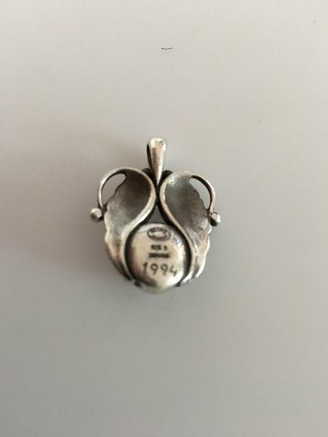 Georg Jensen Annual Pendent in Sterling Silver 1995. Measures 3 cm / 1 3/16 in. Weighs 9.8 g / 0.35 oz.