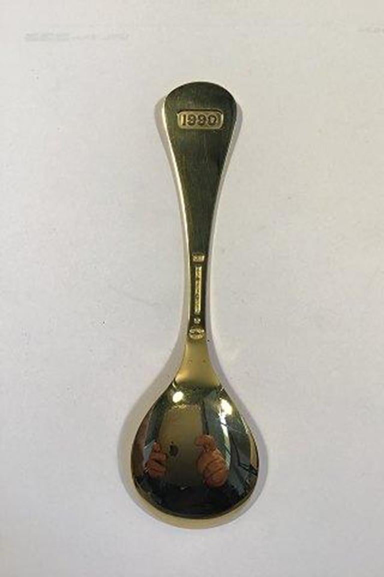 Georg Jensen Annual spoon 1990 gilded sterling silver with enamel. 

Measures 15 cm (5 29/32