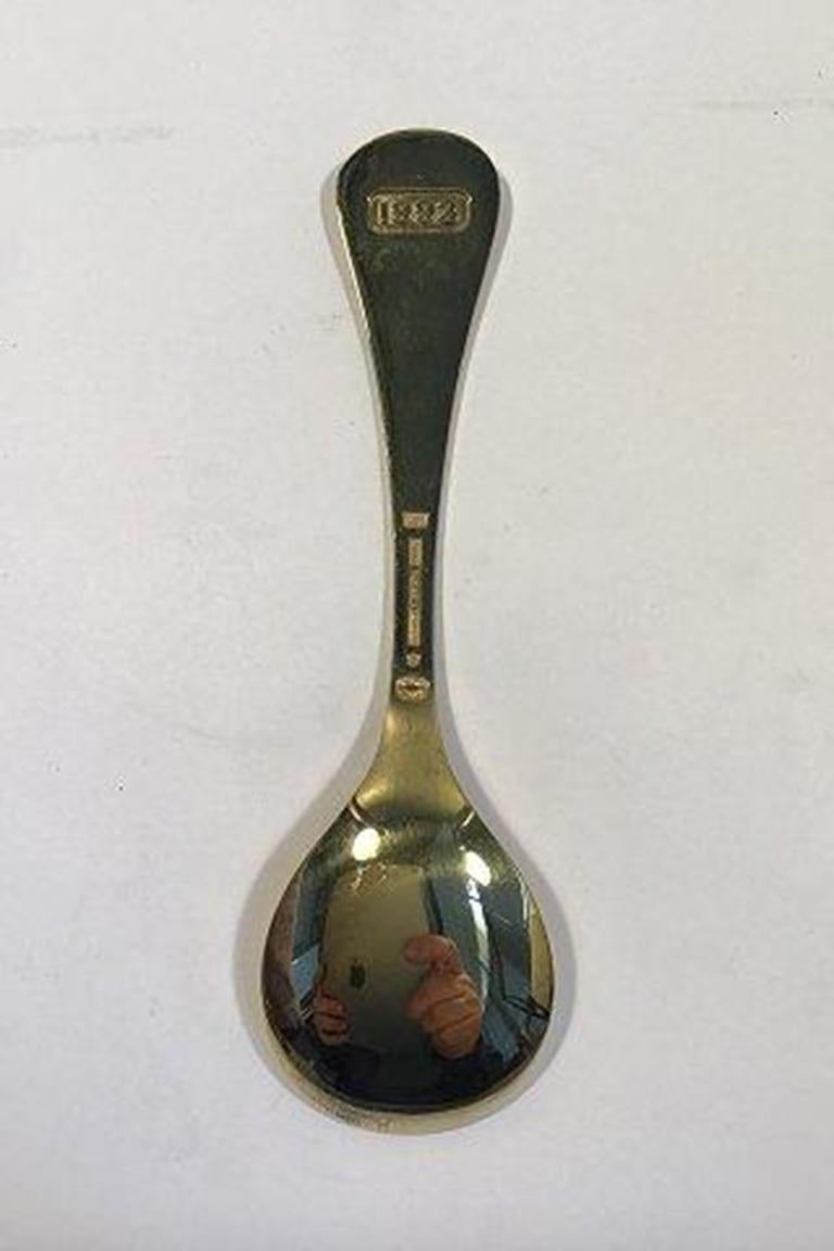 Cucchiaio annuale Georg Jensen 1993 in argento sterling dorato con smalto. 

Misura 15 cm (5 29/32