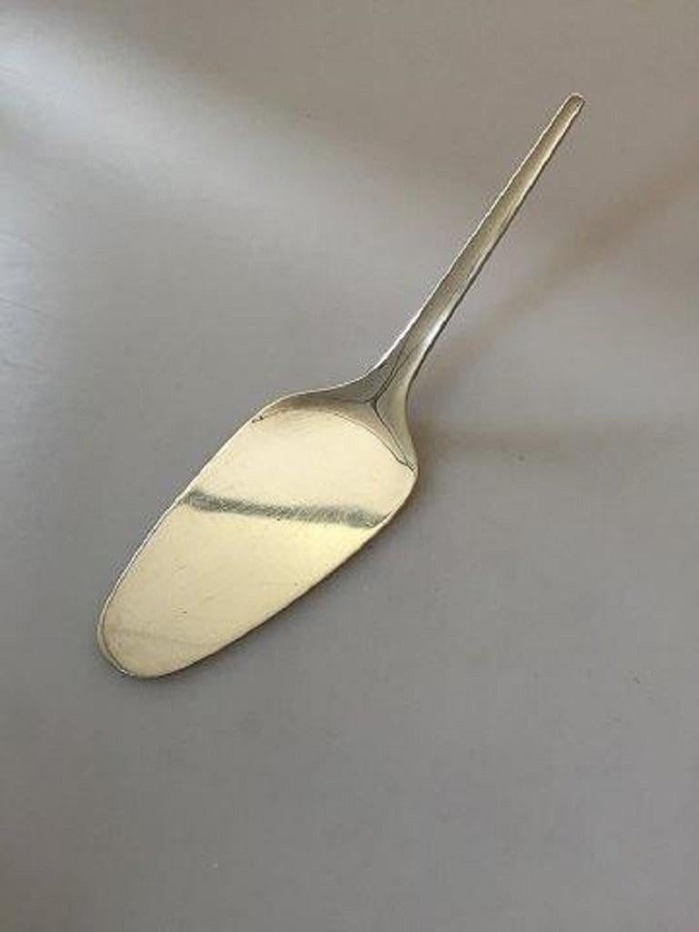 Georg Jensen argo sterling silver layered cake serving spoon.

Measures 23 cm / 9 1/16