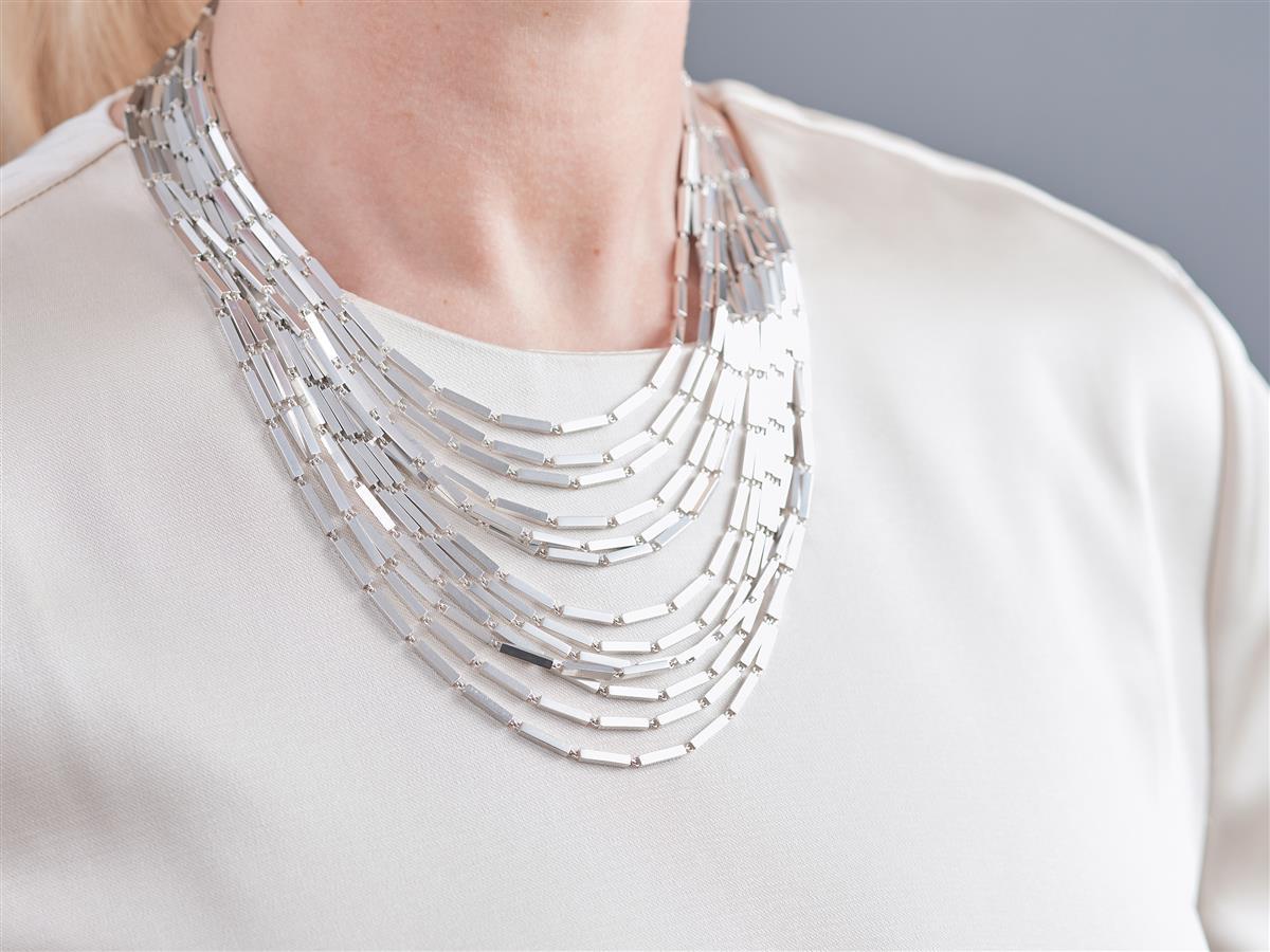 Important and rare multi-strand (13 strands) silver necklace by Georg Jensen, model 593B. The masterpiece of the Georg Jensen Aria collection, 2015. Out of production item, no longer in production.

The necklace comes with its original presentation