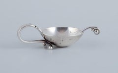 Georg Jensen Art Deco salt cellar with matching salt spoon in sterling silver.