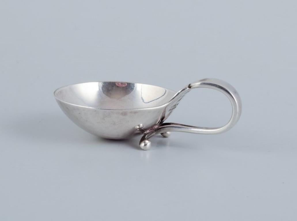Danish Georg Jensen Art Deco salt cellar with matching salt spoon in sterling silver.  For Sale