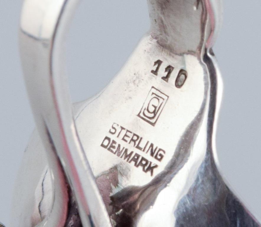 Sterling Silver Georg Jensen Art Deco salt cellar with matching salt spoon in sterling silver.