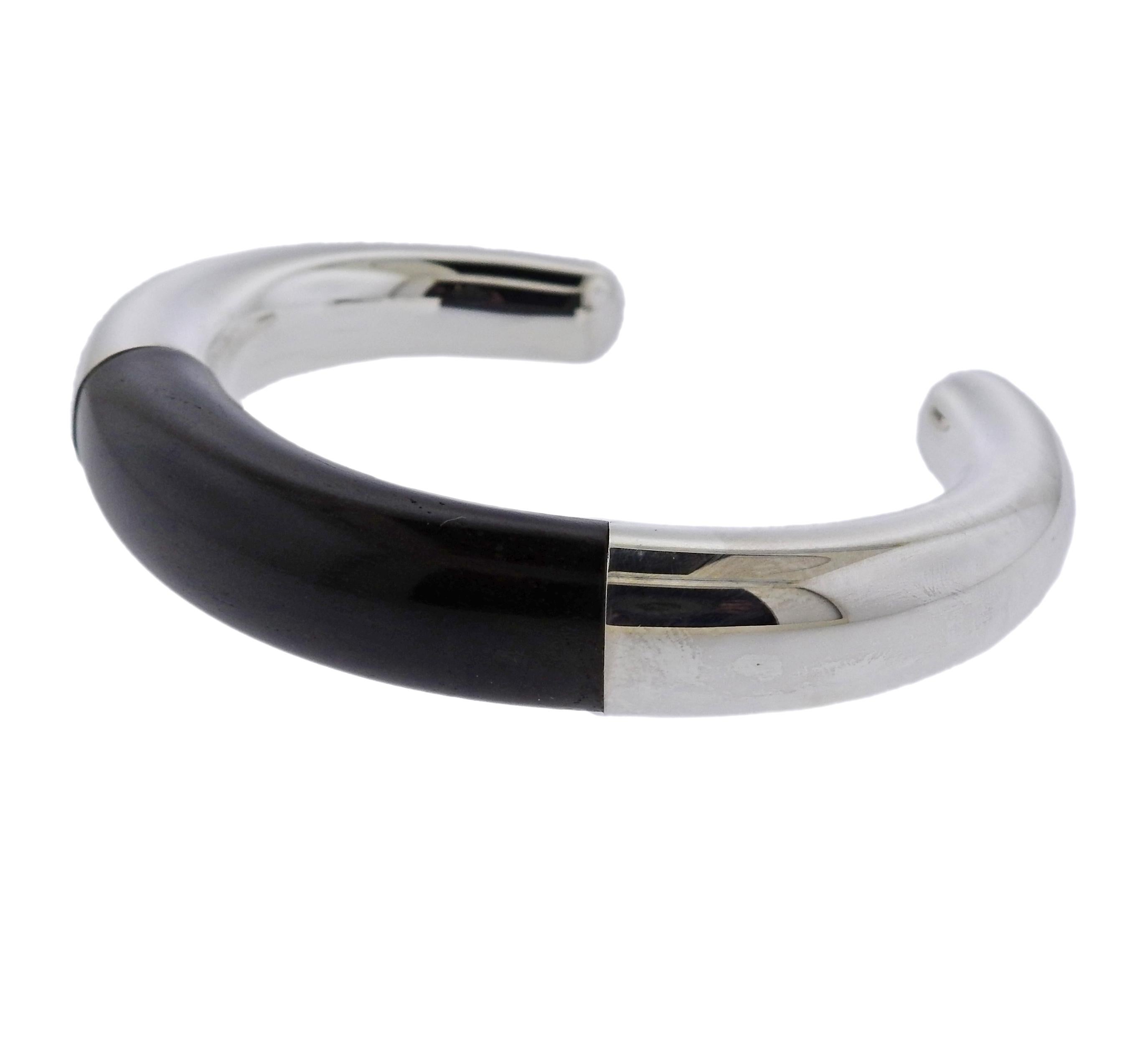 Sterling silver cuff bracelet crafted by Georg Jensen. Brand new with packaging. Bracelet will fit up to 7.25
