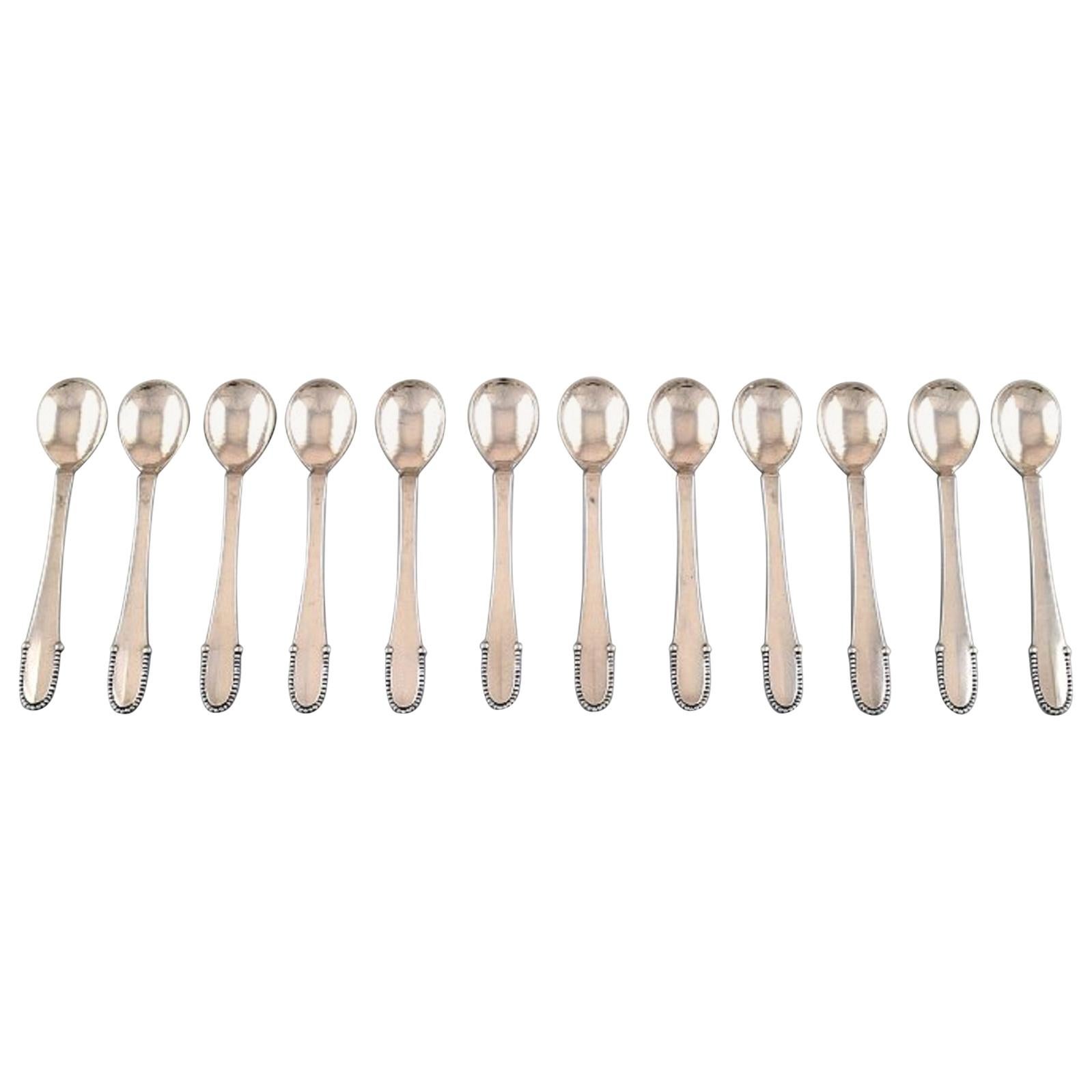 Georg Jensen Beaded 12 Tea Spoons in Full Silver For Sale