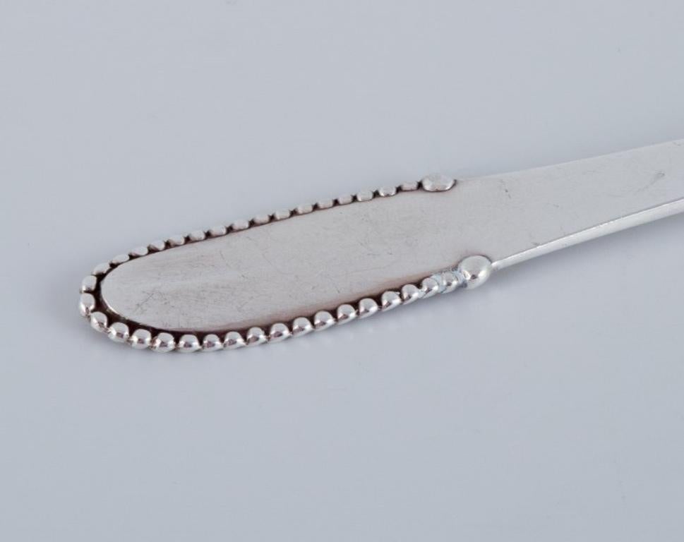 Georg Jensen Beaded. Butter sauce spoon in sterling silver. In Excellent Condition For Sale In Copenhagen, DK