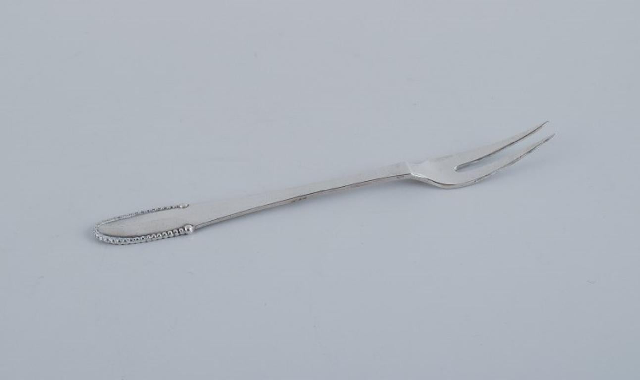 Georg Jensen Beaded.
Four cold meat forks in 830 silver.
Early 1915-1930 Hallmark.
In excellent condition.
Dimensions: L 13.6 cm.