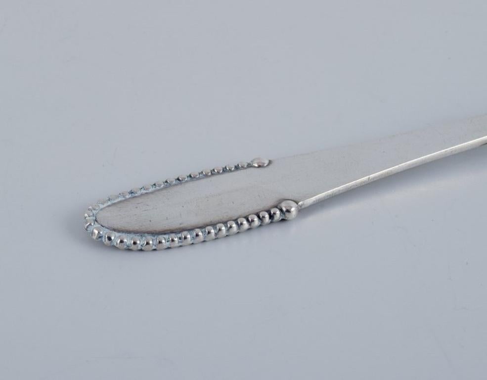 Danish Georg Jensen Beaded. Four cold meat forks in 830 silver. Early 1915-1930 For Sale