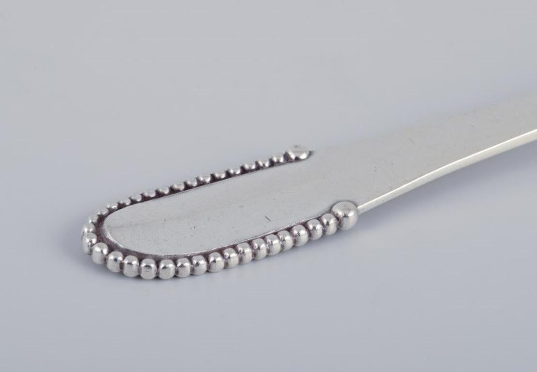 Mid-20th Century Georg Jensen Beaded, nine cake forks in sterling silver. Hallmark: 1933–1944. For Sale