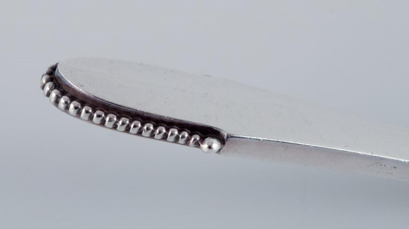 Danish Georg Jensen Beaded. Serving spade in sterling silver with steel blade. For Sale