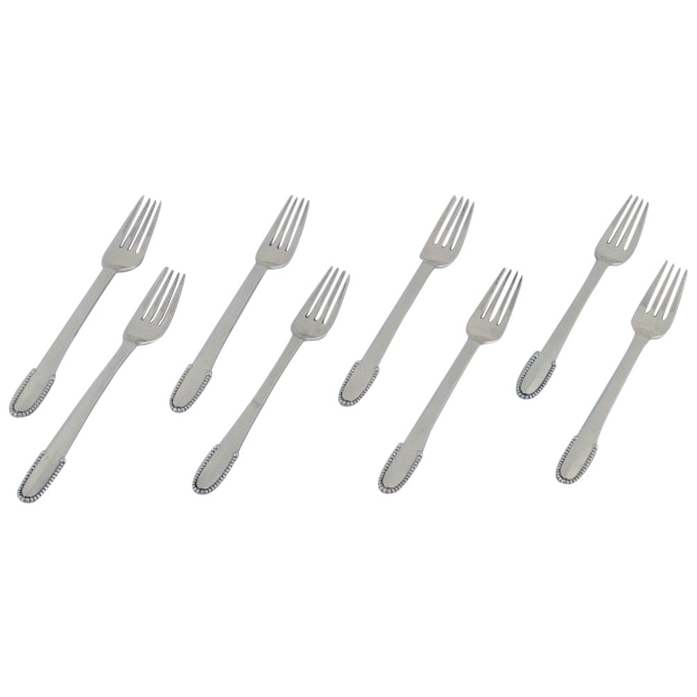 Georg Jensen Perlen. Set von acht Tafelgabeln aus 830er Silber und Sterlingsilber