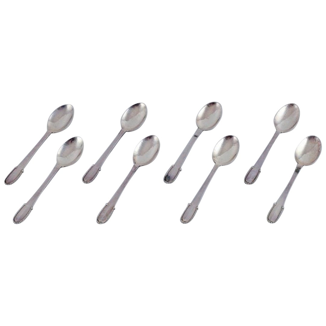Georg Jensen con perline. Set di otto cucchiaini in argento sterling.