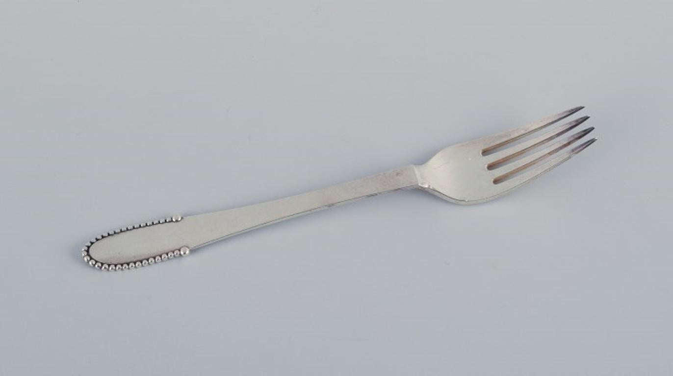 Georg Jensen Beaded.
A set of six lunch forks in sterling silver.
Marked with 1933-1944 hallmarks.
In excellent condition.
Measurements: 18.3 cm.