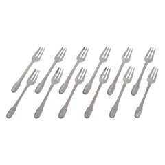 Georg Jensen Perlen. Set von zwölf Kuchengabeln aus Sterlingsilber.