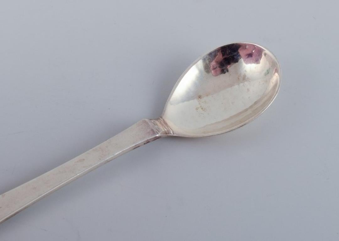 20th Century Georg Jensen Beaded. Set of twelve coffee spoons in sterling silver. For Sale