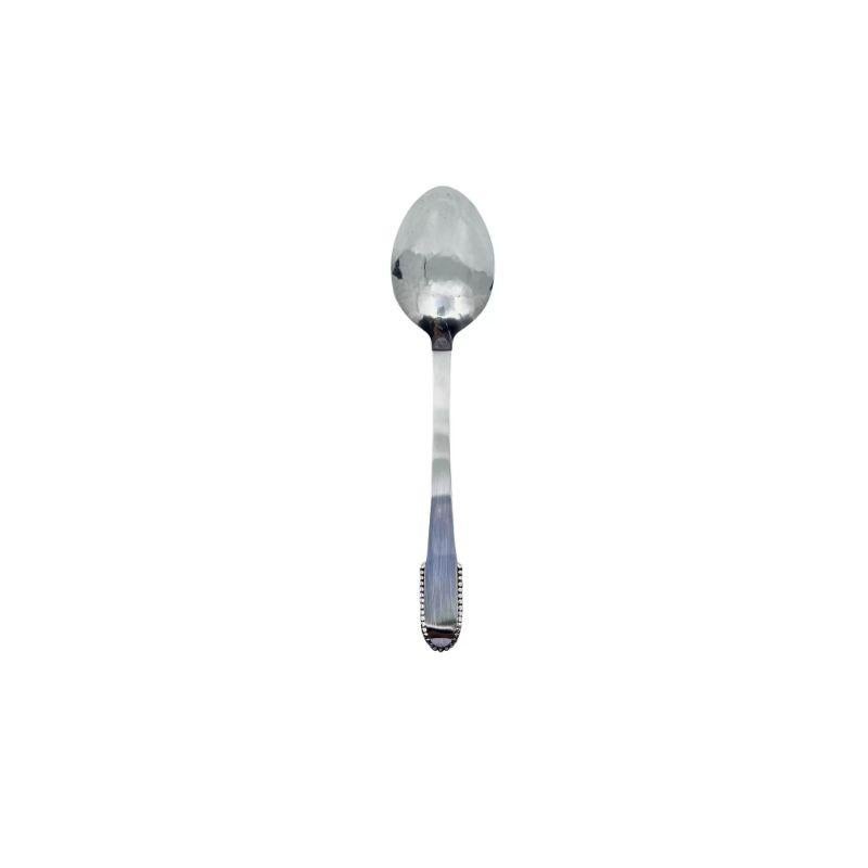 Georg Jensen sterling silver dinner spoon, item #011 in the Beaded pattern, design #7 by Georg Jensen from 1916.

Additional information:
Material: Sterling silver
Styles: Art Nouveau
Hallmarks: With Georg Jensen hallmarks, made in