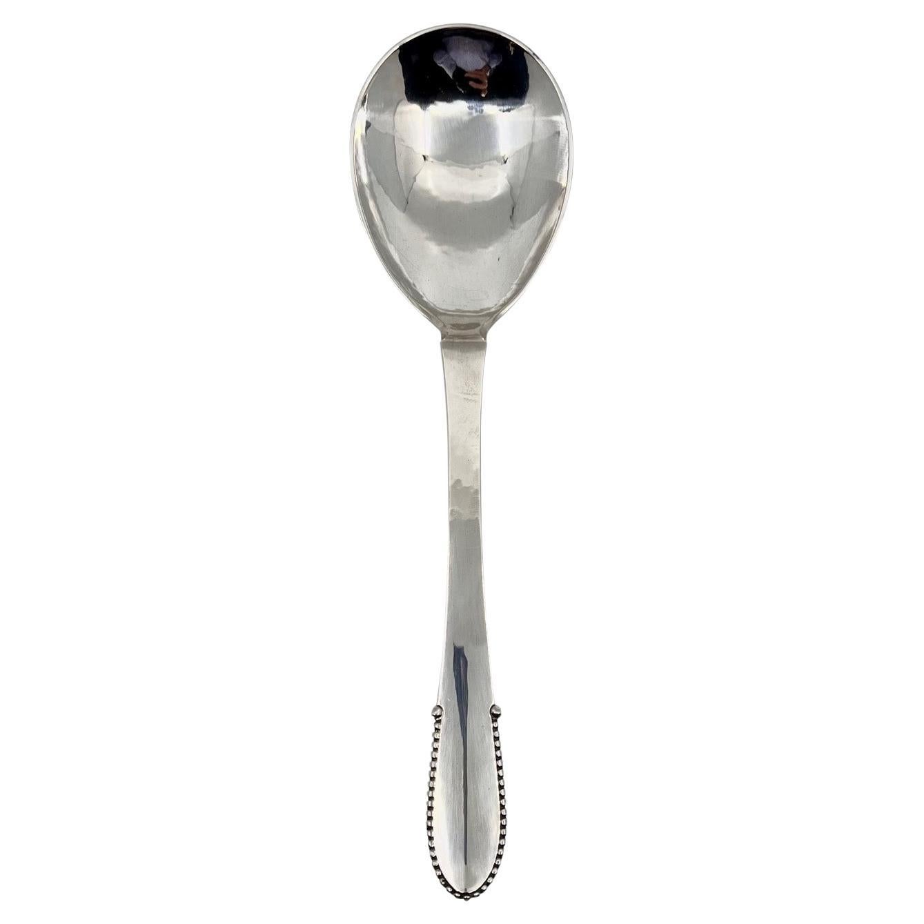 Georg Jensen Beaded Sterling Silver Medium Serving Spoon 113 For Sale