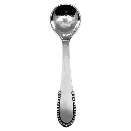 Georg Jensen Beaded Sterling Silver Salt Spoon 104 For Sale