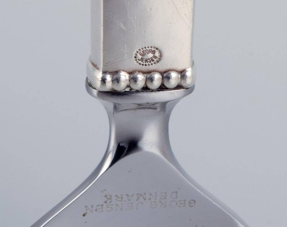 20th Century Georg Jensen Beaded. Two bottle openers in sterling silver.  For Sale
