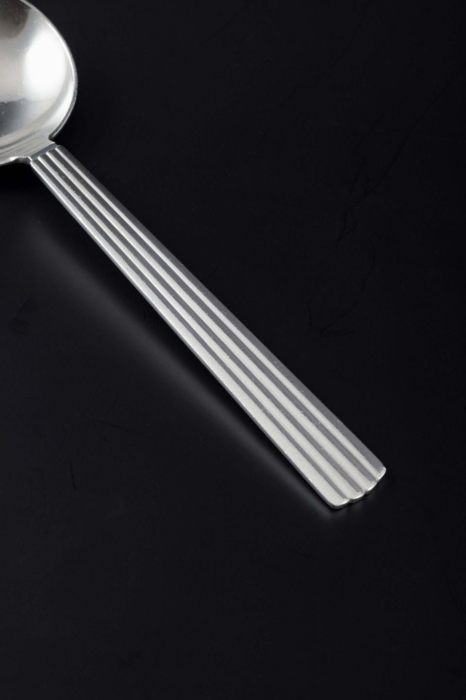 PRE-OWNED GOODS ARE EXEMPT FROM IMPORT TARIFFS FOR U.S., UK, AUSTRALIAN & CANADIAN CUSTOMERS.   
THEREFORE, NO IMPORT TARIFFS WILL BE APPLICABLE TO YOUR PURCHASE. 

Georg Jensen, Bernadotte
Bouillon spoon in sterling silver in the iconic Bernadotte