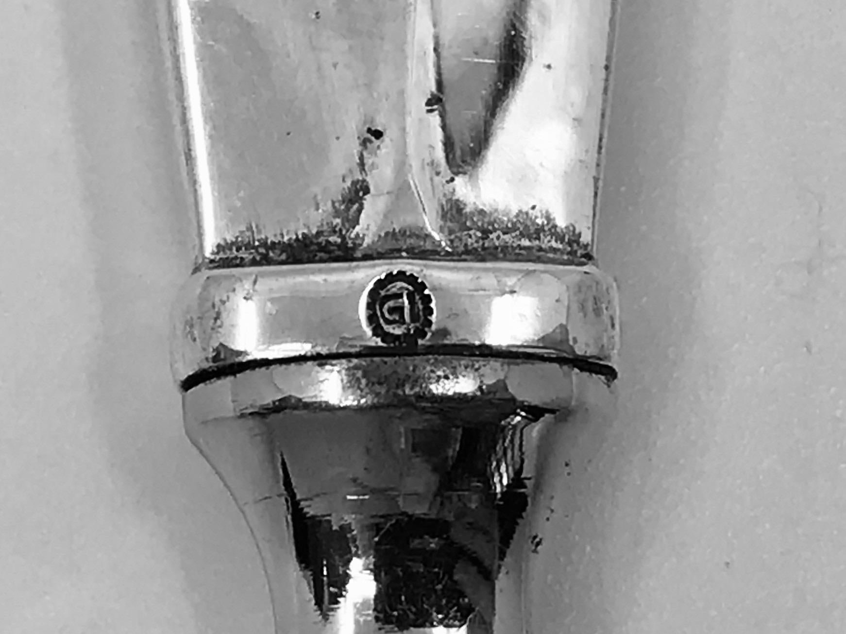 Georg Jensen sterling silver and stainless short handled bottle opener, item 271 in the Bittersweet pattern, flatware design #79 by Gundorph Albertus from 1940. Bittersweet is the sister pattern to Albertus’ better known Cactus pattern, because of