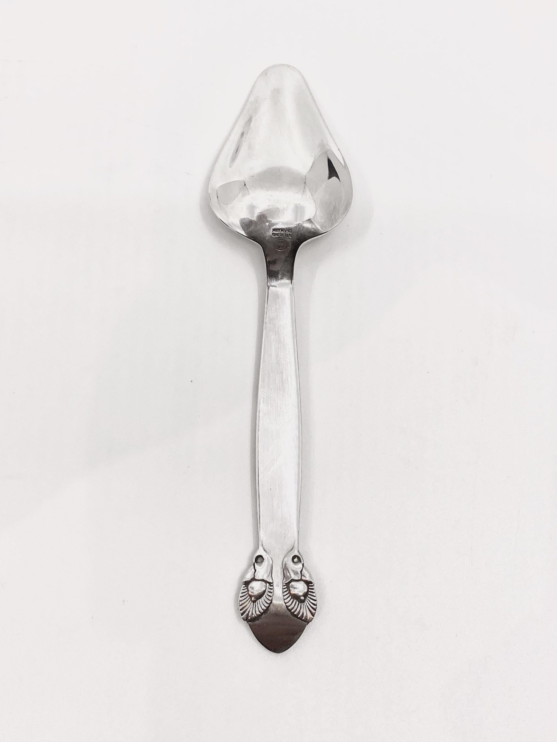 A sterling silver Georg Jensen grapefruit spoon, item #075 in the very rare Bittersweet pattern, design #79 from 1940 by Gundorph Albertus. This is the sister pattern to Cactus, also designed by Gundorph Albertus.

Additional information:
Material: