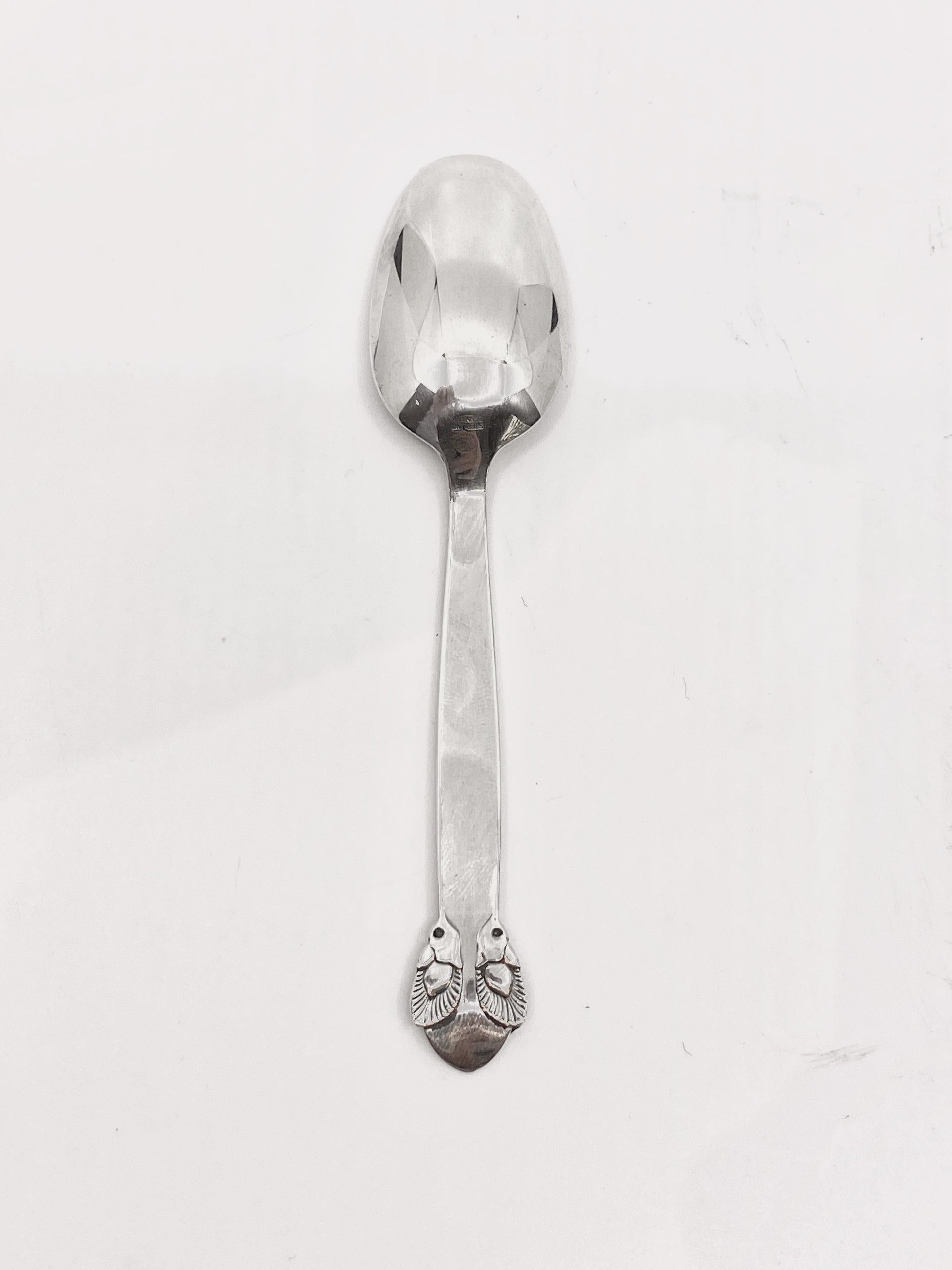 A Georg Jensen sterling silver medium teaspoon, item #032 in the rare Bittersweet pattern, design #79 from 1940 by Gundorph Albertus. This is the sister pattern to Cactus, also designed by Gundorph Albertus.

Additional information:
Material: