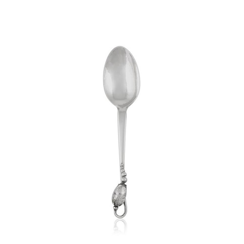A sterling silver Georg Jensen dessert spoon, item 021 in the Blossom 