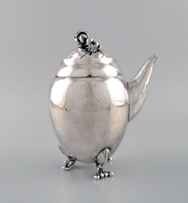 Art Nouveau Georg Jensen Blossom Teapot in Hammered Sterling Silver with Ivory Handle For Sale