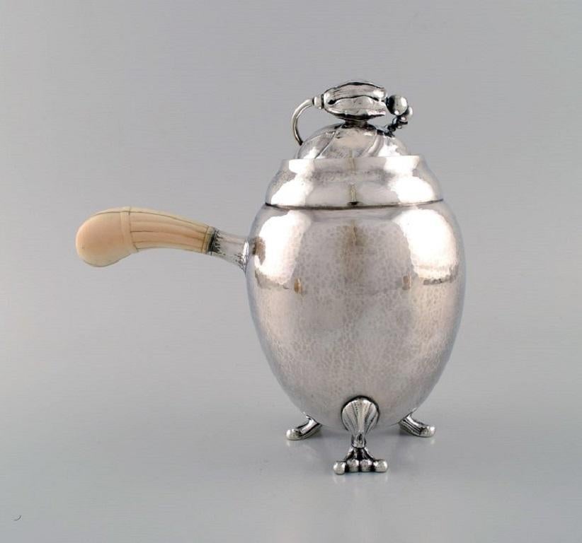 Danish Georg Jensen Blossom Teapot in Hammered Sterling Silver with Ivory Handle For Sale