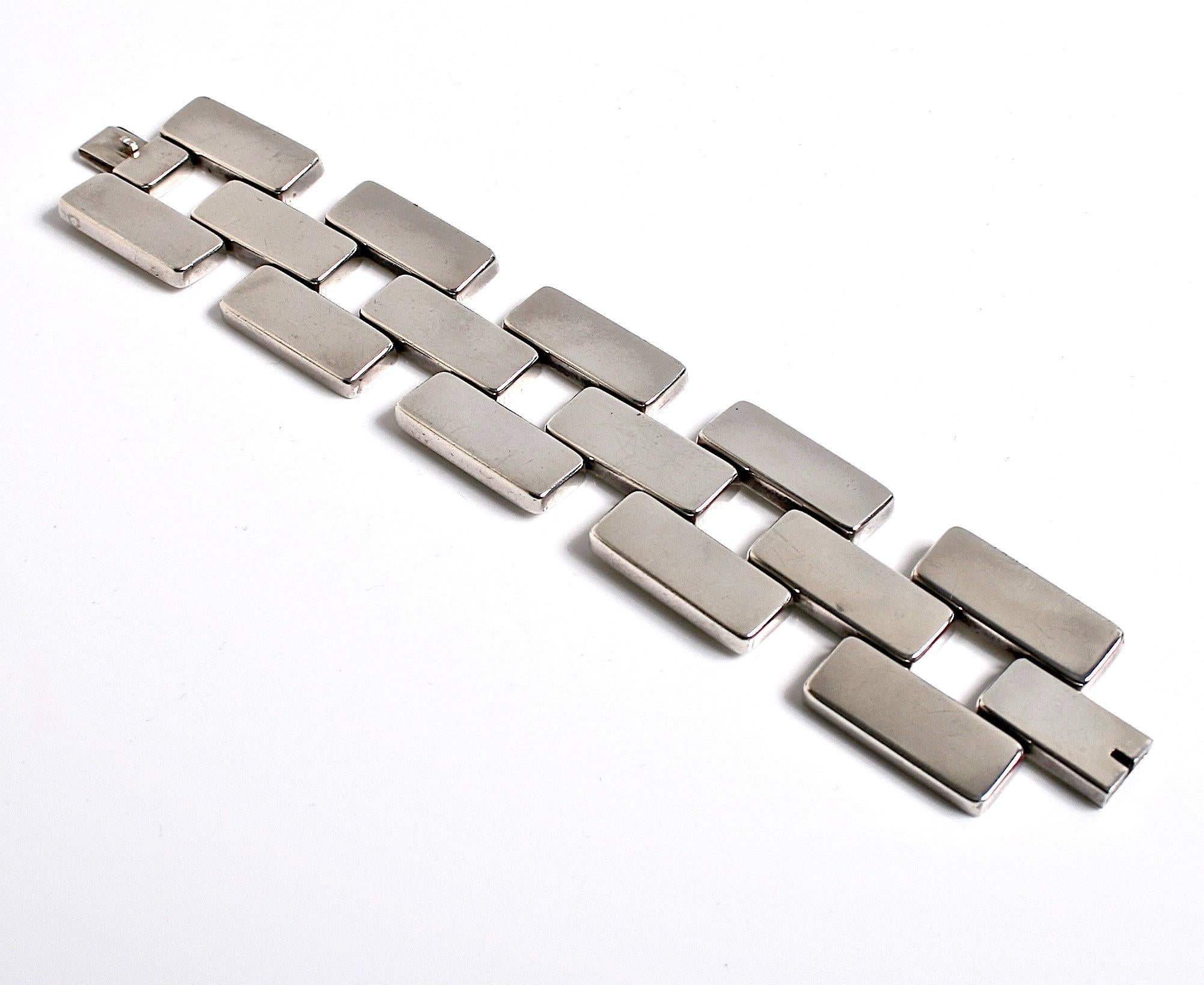 Georg Jensen Large Bold sterling silver bracelet designed by Astrid Fog Denmark c.1960 
Design number 194 comes in a Georg Jensen box
Tight clasp very rare unusual design
Astrid Fog was a fashion designer who started designing jewellery to