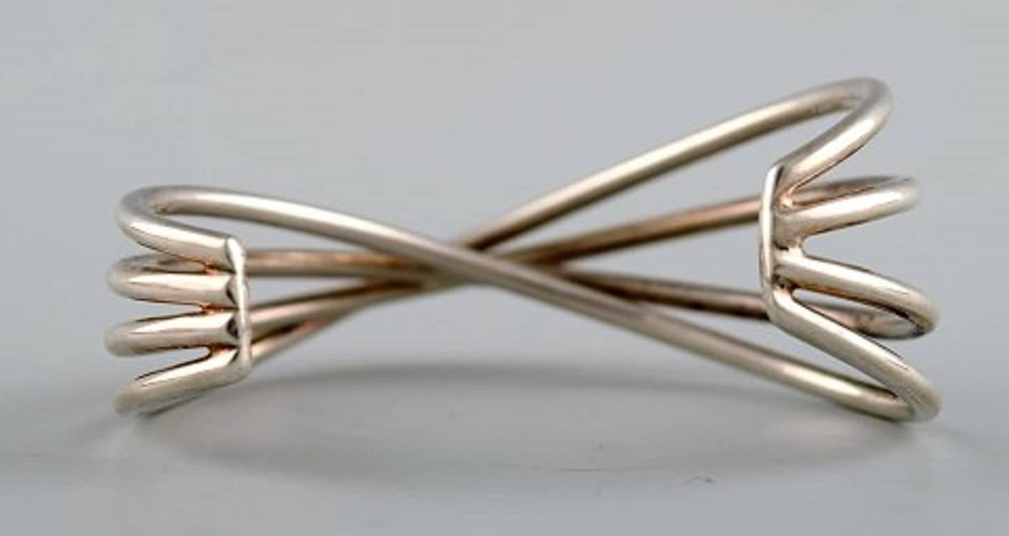 Georg Jensen. Bracelet - Model Double Alliance - Made in sterling silver. Designed by Allan Scharff for Georg Jensen.
Measures: Diameter approx. 6 cm.
Stamped.
In perfect condition