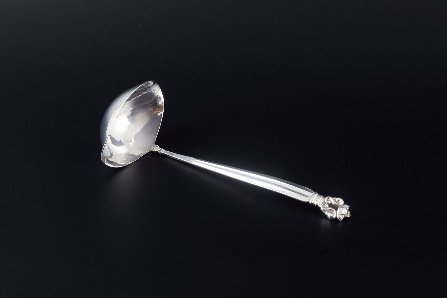 Georg Jensen. Butter sauce ladle in the “Acorn” pattern. Sterling silver.