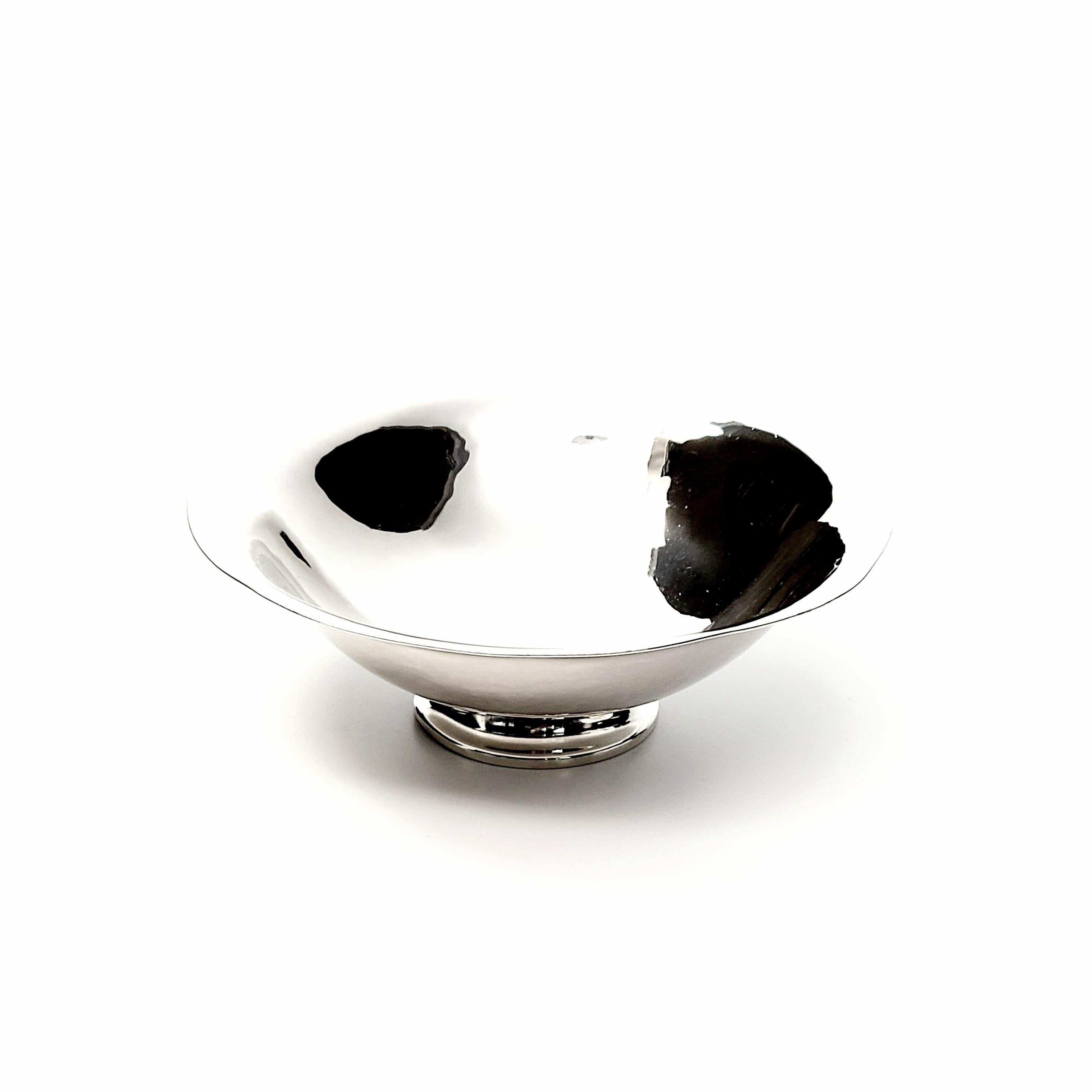 Vintage Georg Jensen sterling silver footed bowl #575B, circa 1945-1951.

By well-known designer Harald Nielsen, this piece is a Classic example of his typical designs that focus on form and clean lines. This piece was sold at the Copenhagen