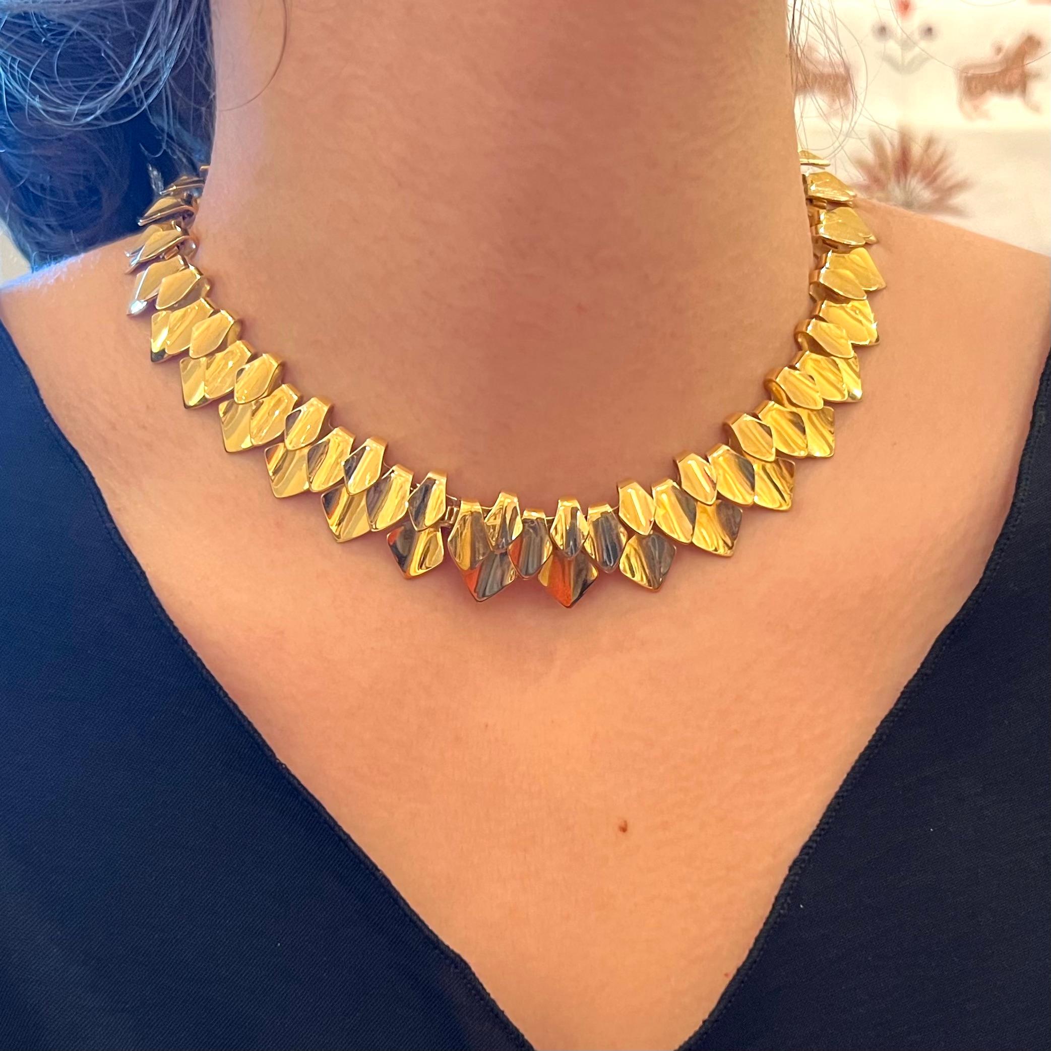 A rare and exquisite 18-karat yellow gold collar by Tuk Fischer for Georg Jensen, 1963
Stamped Georg Jensen, 18k, 750, numbered. 

An heirloom quality set along with the matching bracelet is also available. This rich gold collar is one of the most
