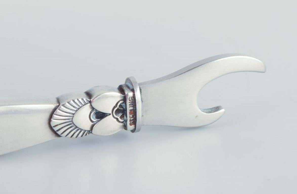 Georg Jensen Cactus. Bottle opener in sterling silver and stainless steel.
The 
