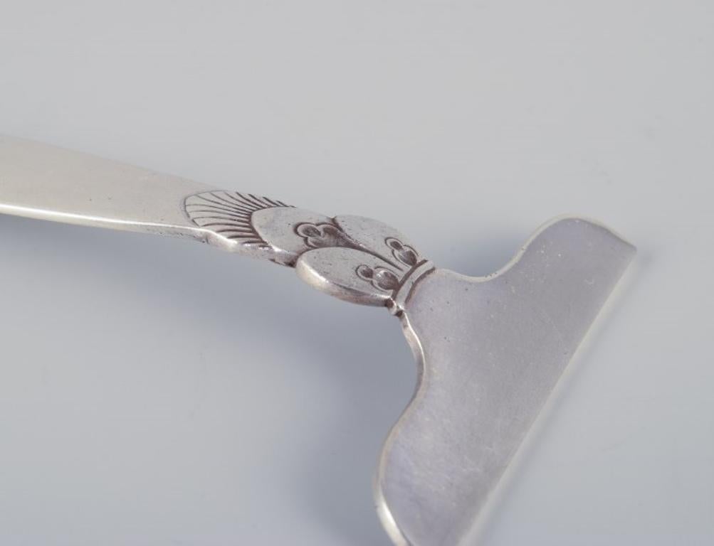 Danish Georg Jensen Cactus child pusher in sterling silver. Dated 1931 For Sale