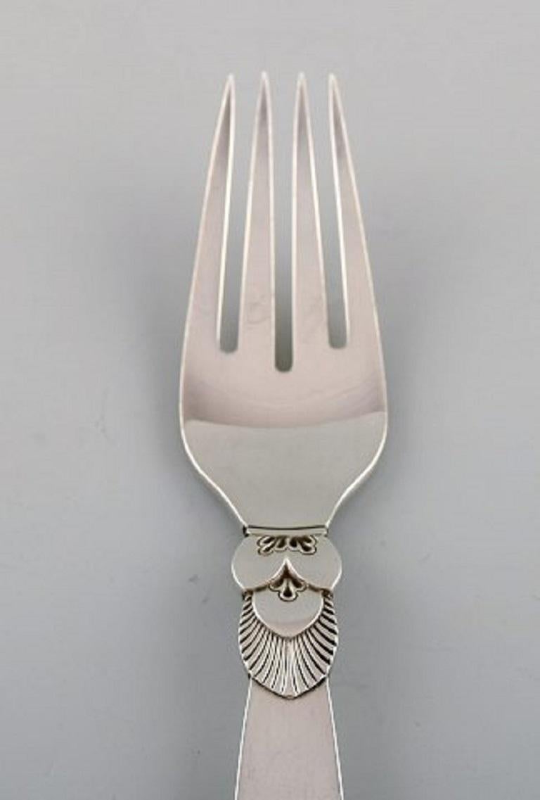 Georg Jensen cactus dinner fork in sterling silver. 12 pieces in stock.
Designer: Gundorph Albertus.
Measures: 18.5 cm.
Stamped.
In very good condition.